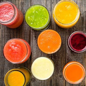 multicolor juices in glasses